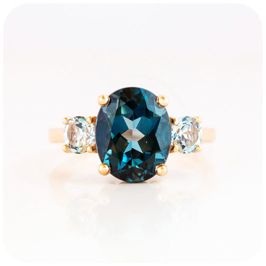 Oval cut London Blue Topaz and Sky Blue Topaz Trilogy Anniversary Ring - Victoria's Jewellery