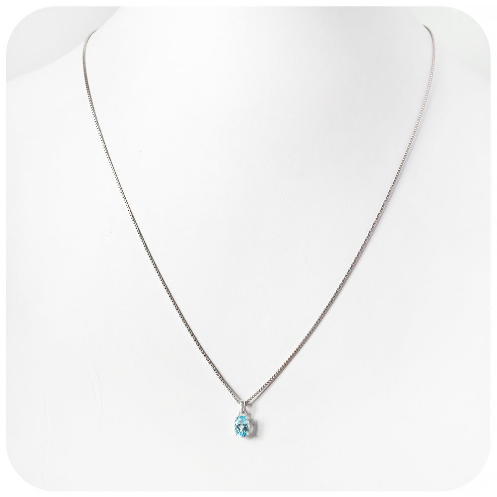 oval cut sky blue topaz, november birthstone pendant and chain