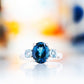 Hallie, an Oval cut London Blue and Sky Blue Topaz Trilogy Ring