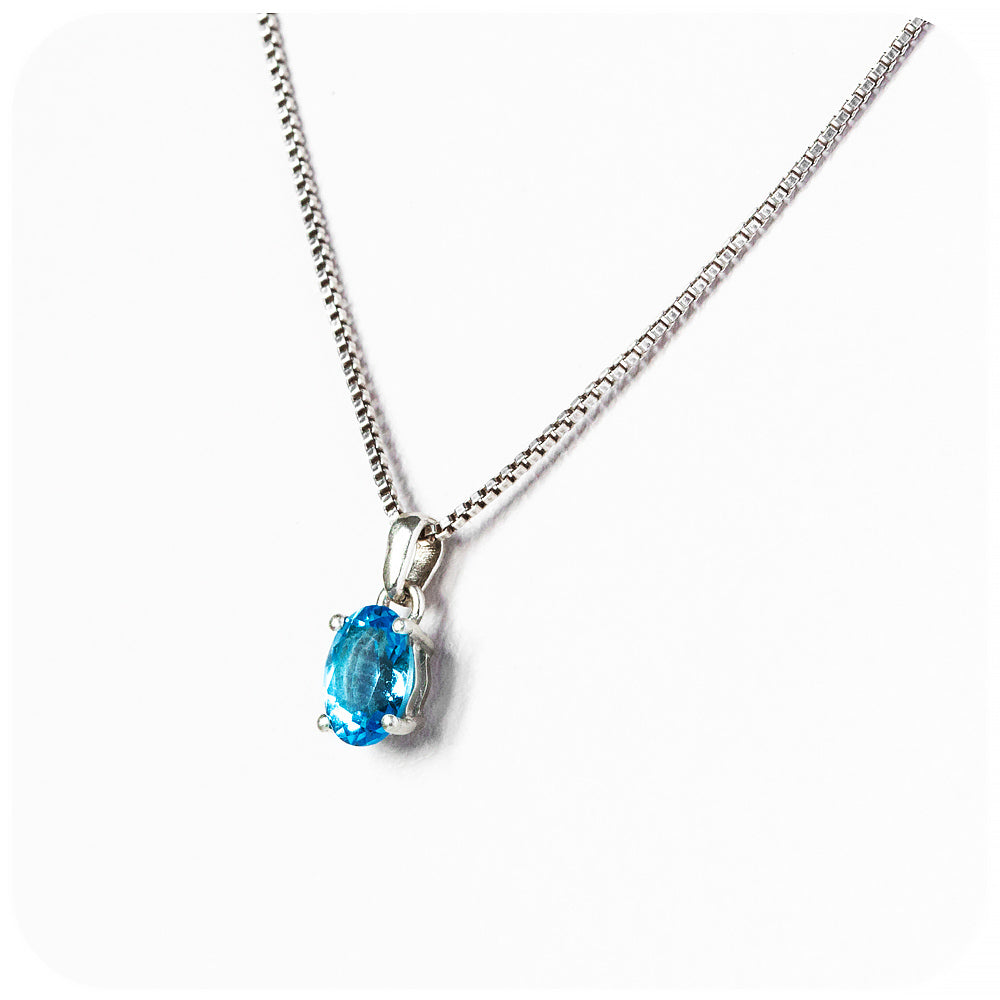 oval cut teal london blue topaz, november birthstone pendant and chain