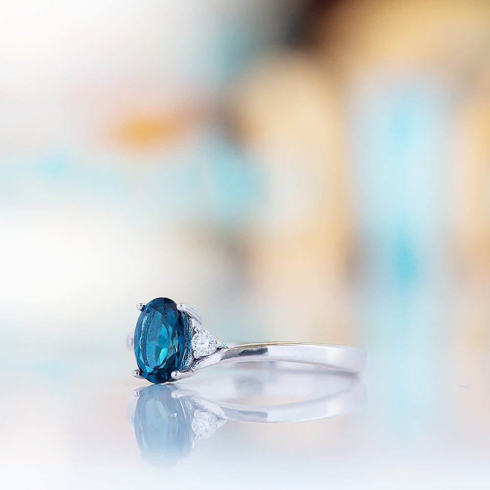 Georgie, a London Blue Topaz and Diamond Trilogy Ring