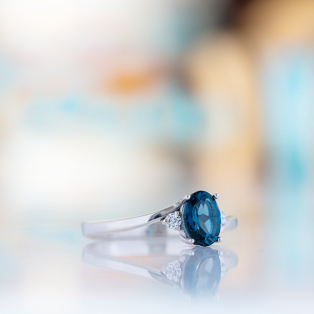 Georgie, a London Blue Topaz and Diamond Trilogy Ring