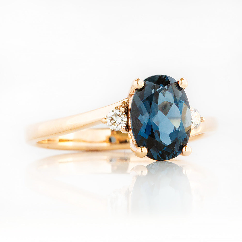 Georgie, a London Blue Topaz and Diamond Trilogy Ring - 8x6mm