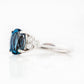 Este, an Oval cut London Topaz and Lab Diamond Ring