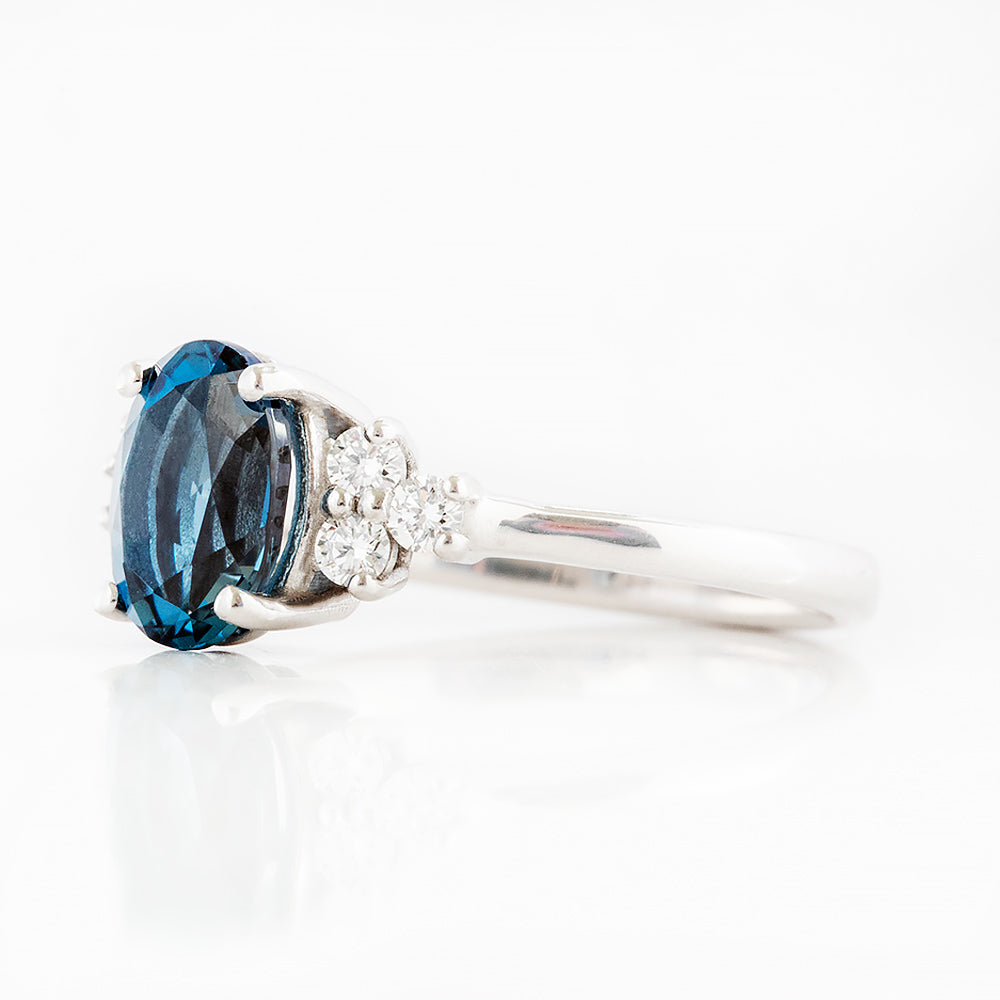 Este, an Oval cut London Topaz and Lab Diamond Ring