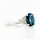 Este, an Oval cut London Topaz and Lab Diamond Ring