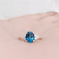 Este, an Oval cut London Topaz and Lab Diamond Ring