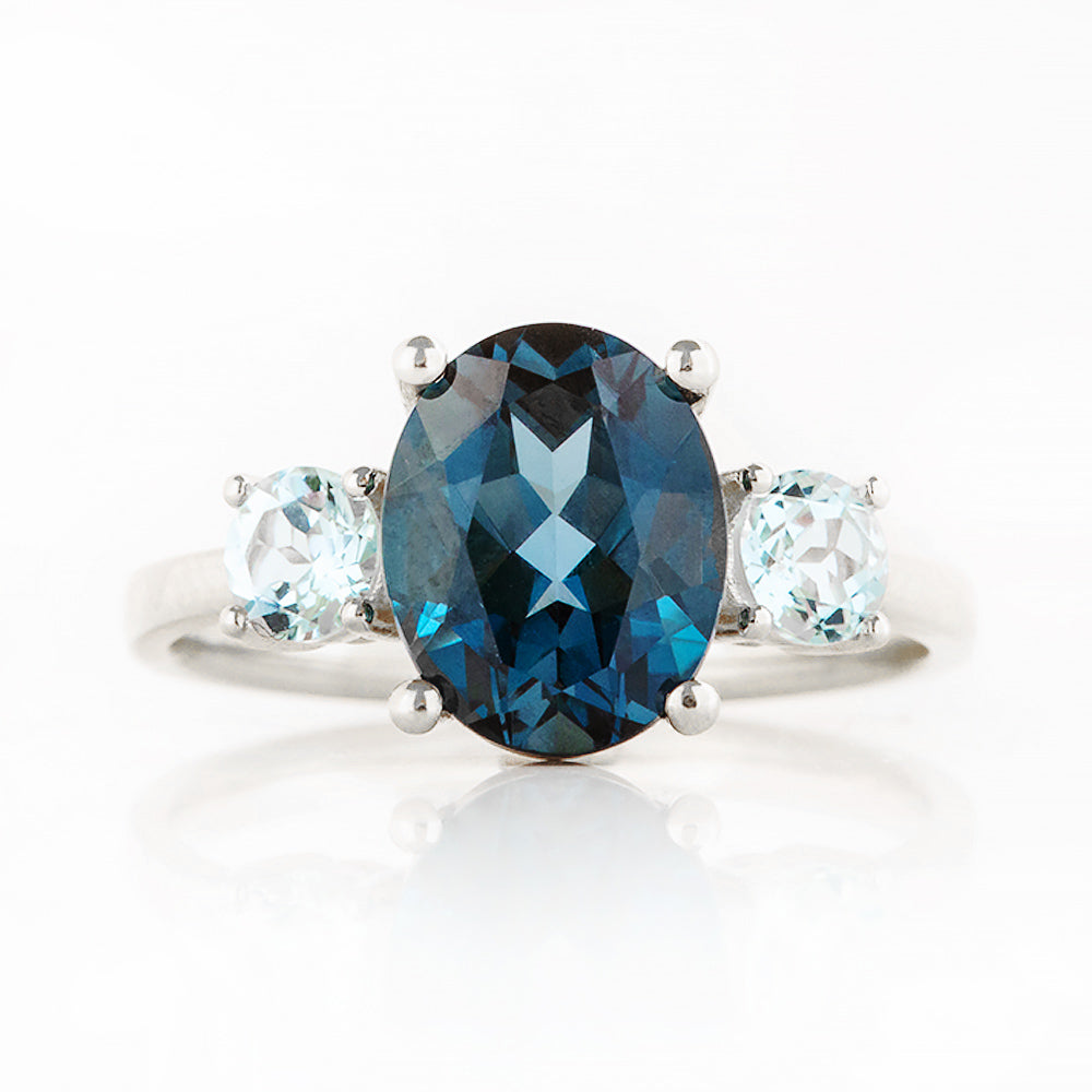 Hallie, an Oval cut London Blue and Sky Blue Topaz Trilogy Ring - Victoria's Jewellery