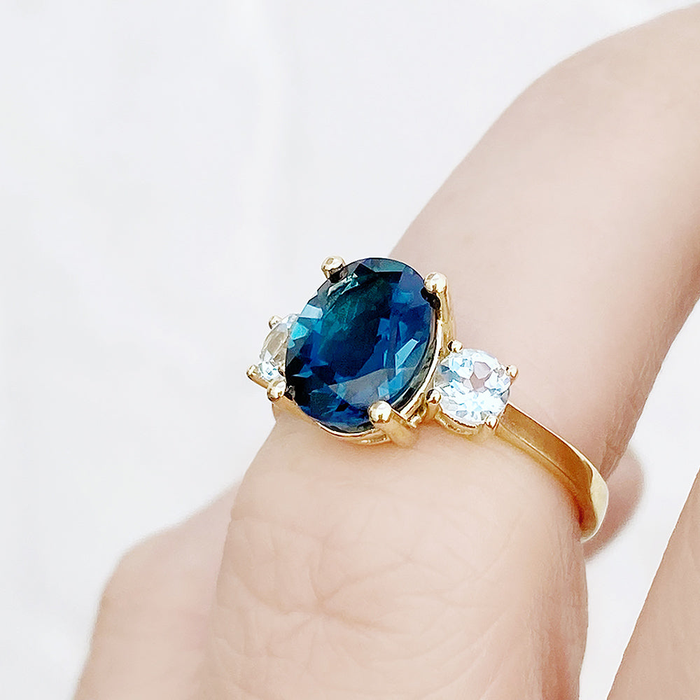 Hallie, an Oval cut London Blue and Sky Blue Topaz Trilogy Ring - Victoria's Jewellery