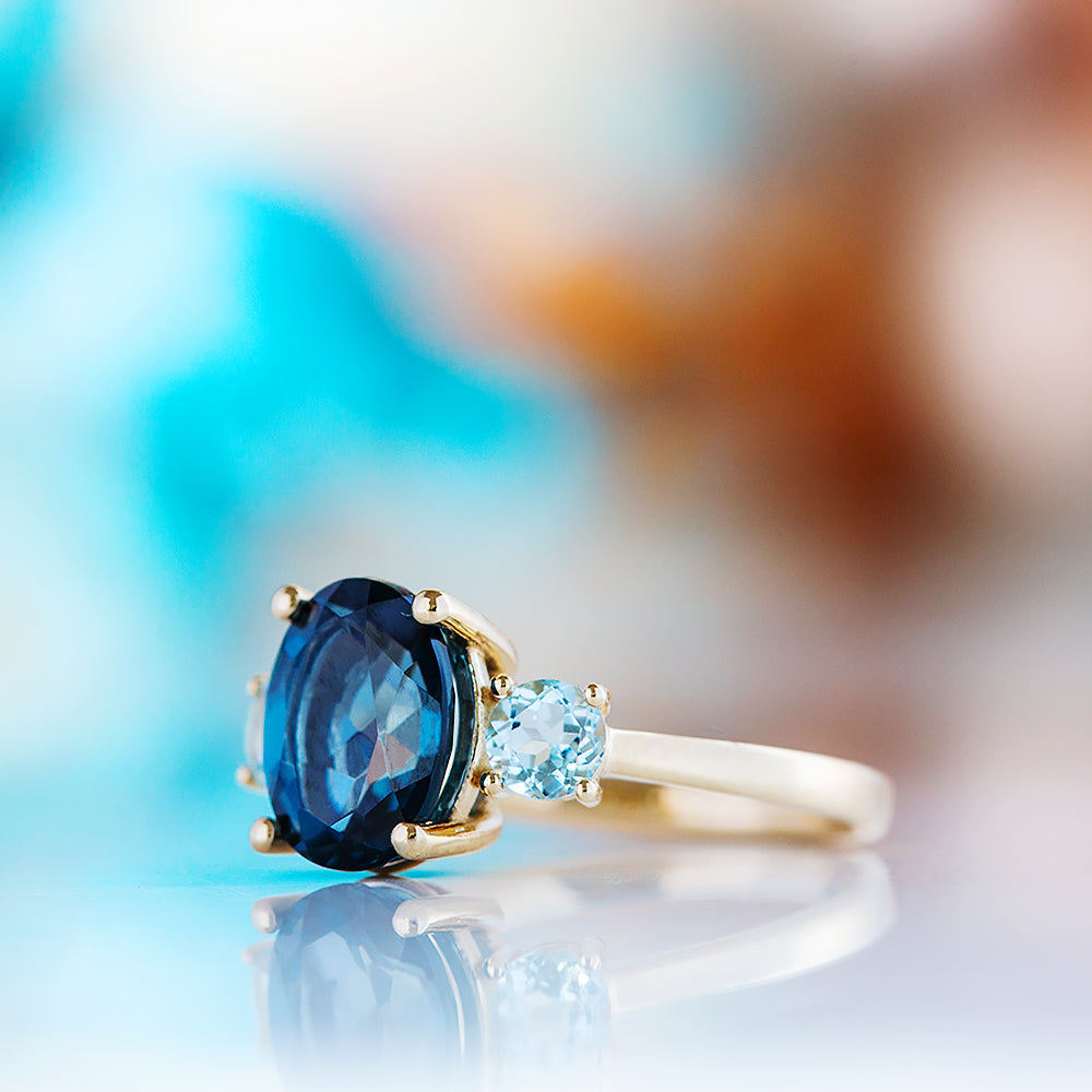 Hallie, an Oval cut London Blue and Sky Blue Topaz Trilogy Ring - Victoria's Jewellery