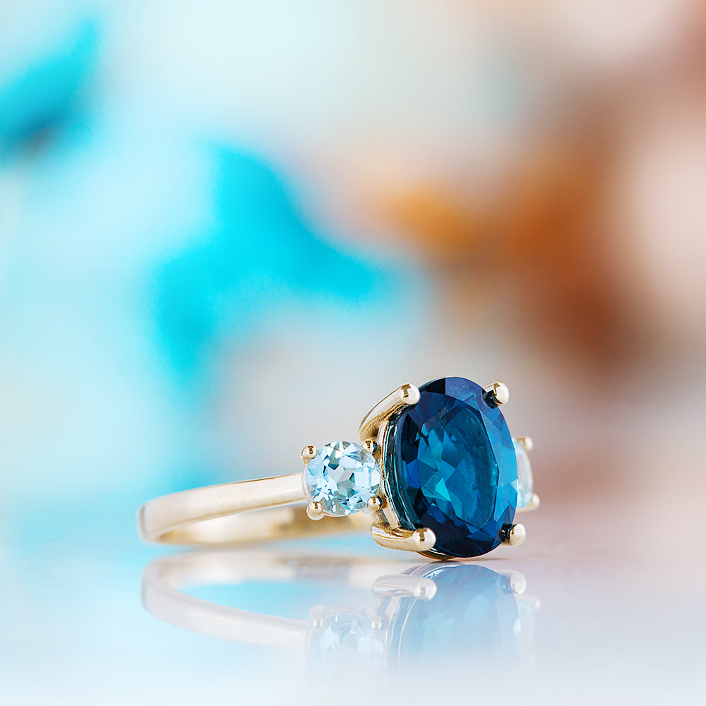 Hallie, an Oval cut London Blue and Sky Blue Topaz Trilogy Ring - Victoria's Jewellery