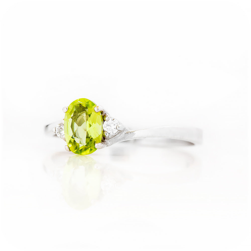 Oval cut Peridot and Lab Diamond Trilogy Engagement Ring in White Gold - Victoria's Jewellery