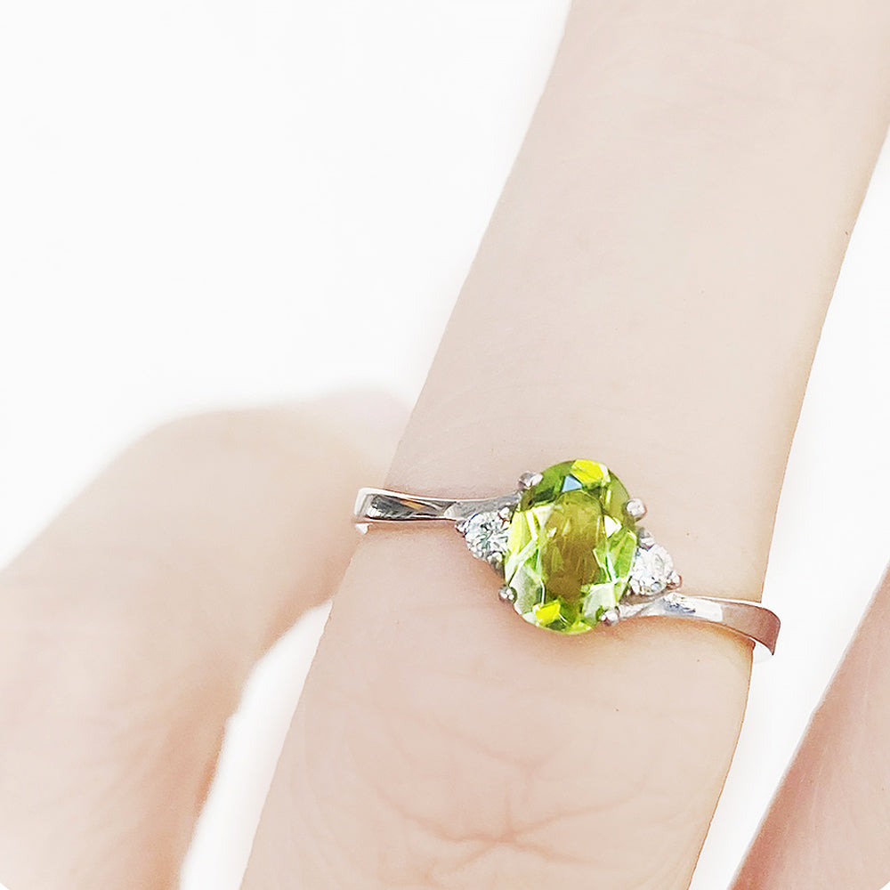 Georgie, a Peridot and Diamond Trilogy Ring - Victoria's Jewellery