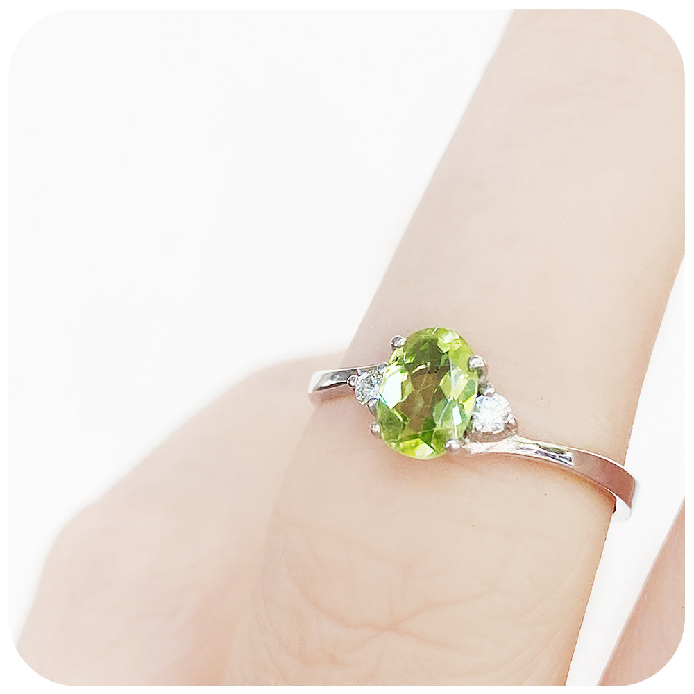 Oval cut Peridot and Lab Diamond Trilogy Engagement Ring in White Gold - Victoria's Jewellery