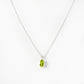 Luna, an Oval cut Peridot Necklace - 7x5mm