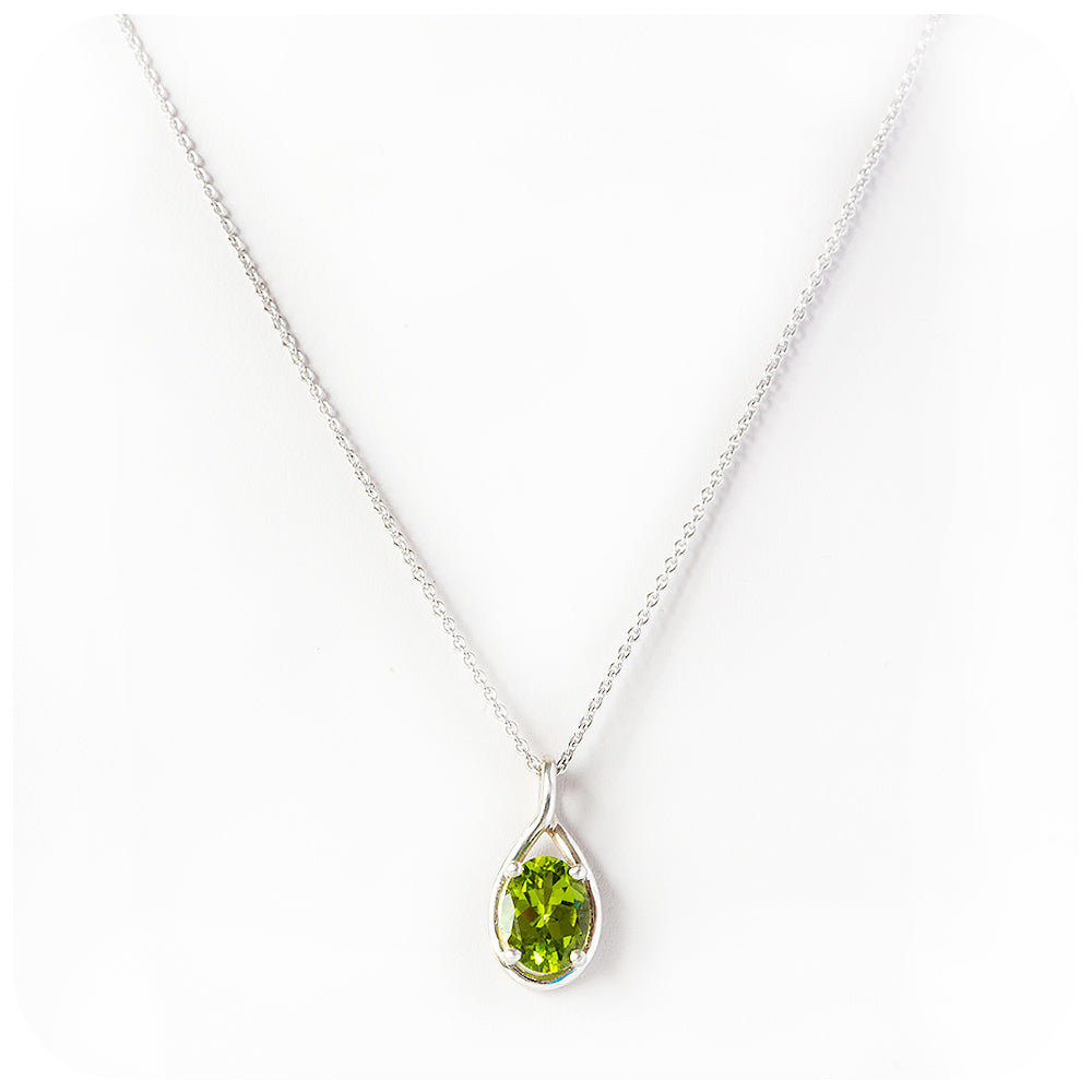 The Infinity Pendant with Peridot - 9x7mm