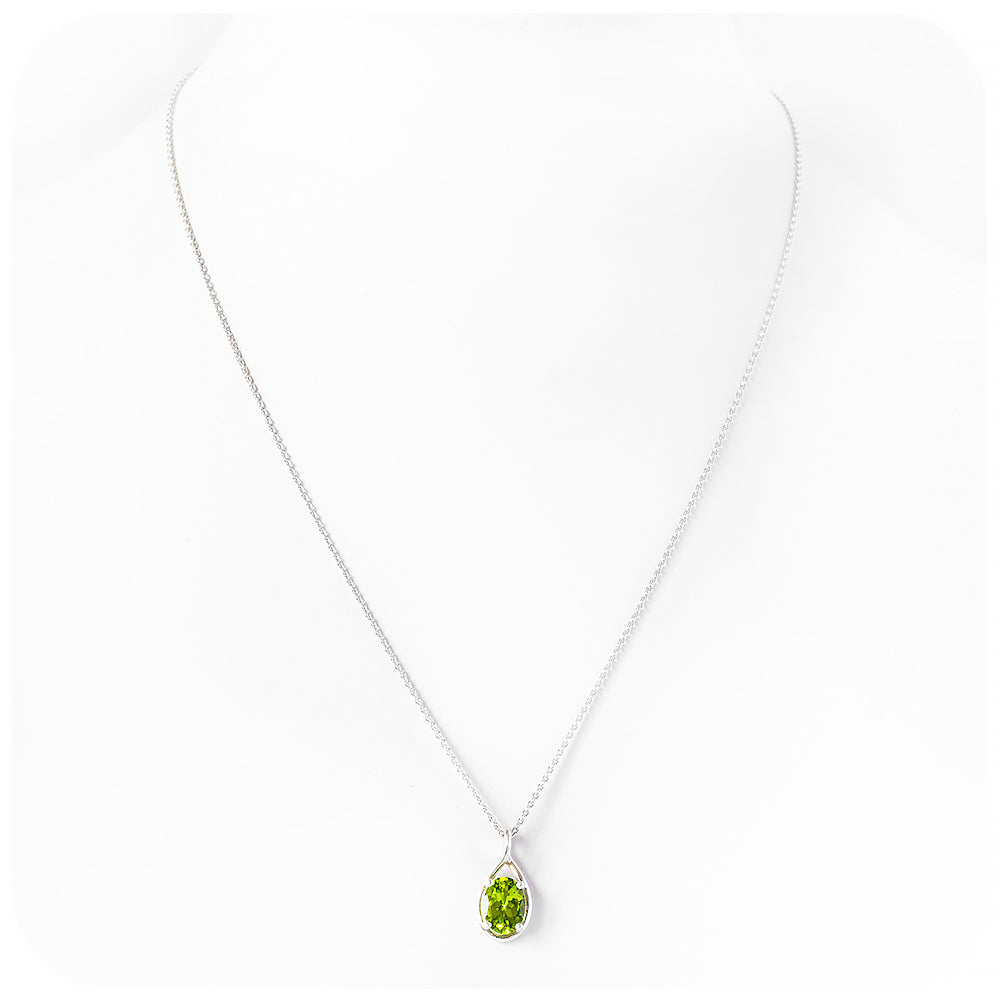 The Infinity Pendant with Peridot - 9x7mm