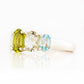 Oval cut Peridot, Prasiolite and Sky Blue Topaz half eternity Anniversary Ring - Victoria's Jewellery
