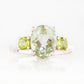 Hallie, an Oval cut Prasiolite and Peridot Trilogy Ring