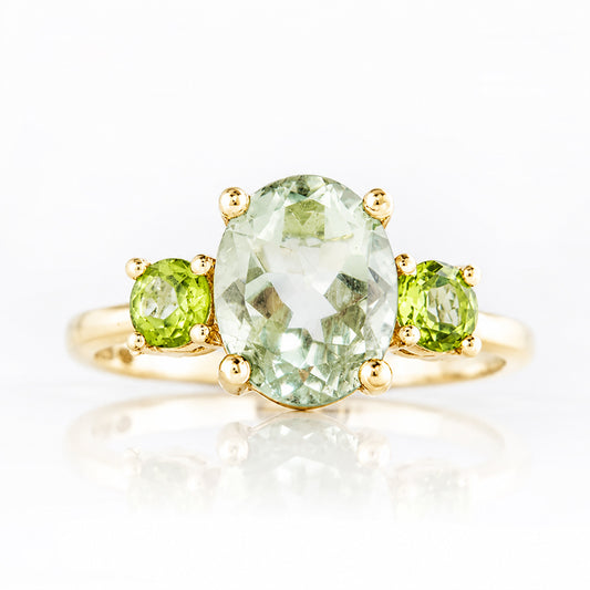 Hallie, an Oval cut Prasiolite and Peridot Trilogy Ring