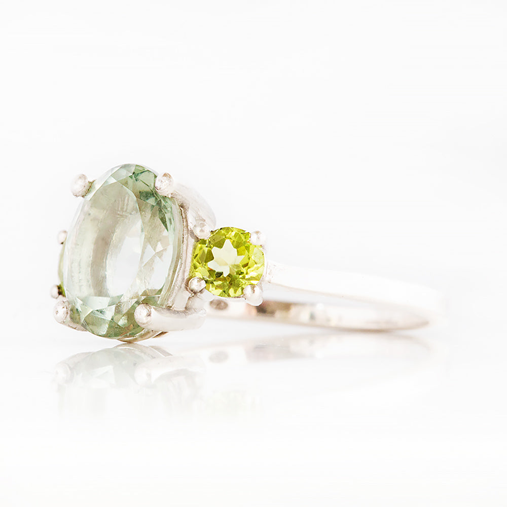 Hallie, an Oval cut Prasiolite and Peridot Trilogy Ring