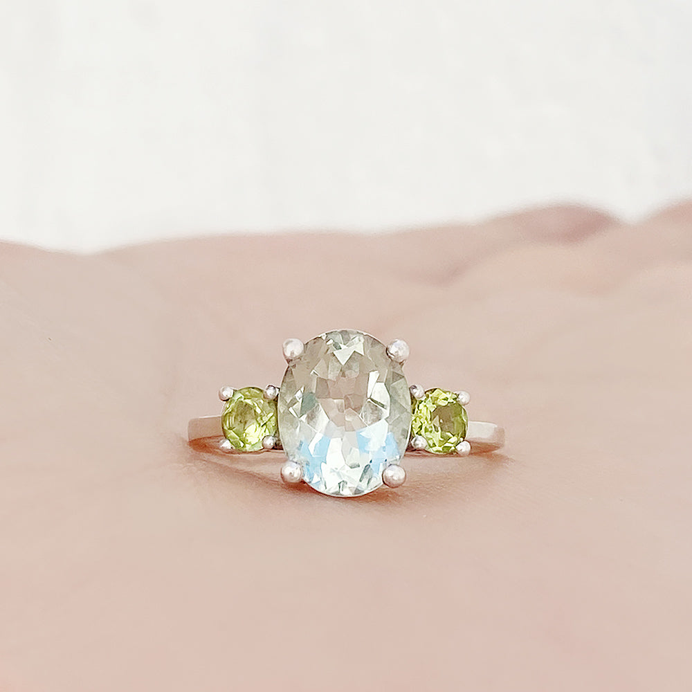 Hallie, an Oval cut Prasiolite and Peridot Trilogy Ring