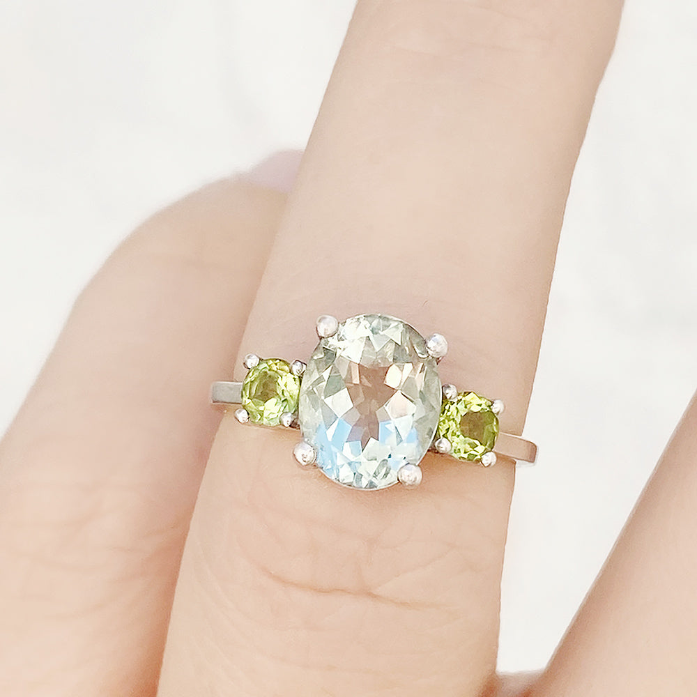 Hallie, an Oval cut Prasiolite and Peridot Trilogy Ring