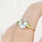 Hallie, an Oval cut Prasiolite and Peridot Trilogy Ring