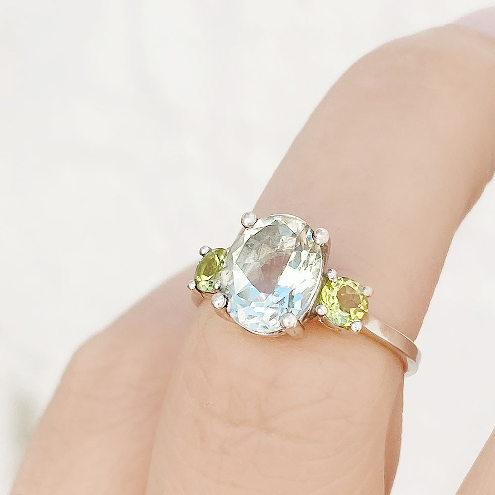 Hallie, an Oval cut Prasiolite and Peridot Trilogy Ring