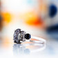 Hallie, a Black Rutile and Spinel Trilogy Ring