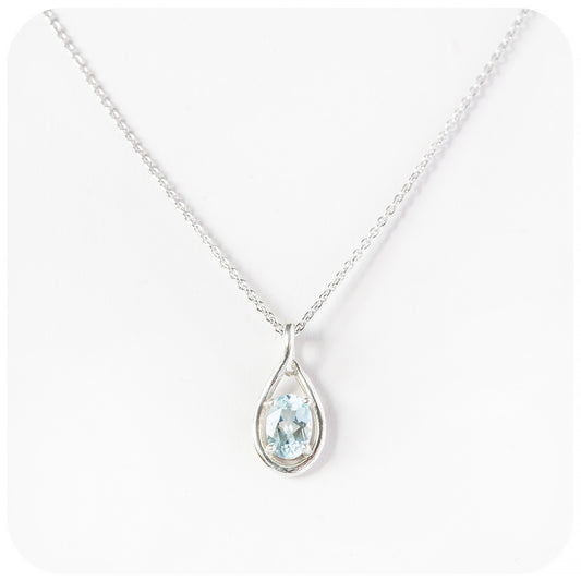 The Infinity Pendant with Sky Blue Topaz