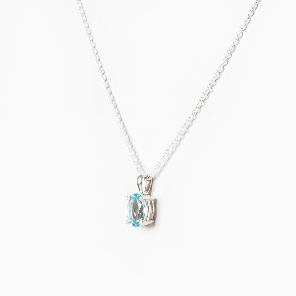 Luna, an Oval cut Sky Blue Topaz Necklace - 7x5mm