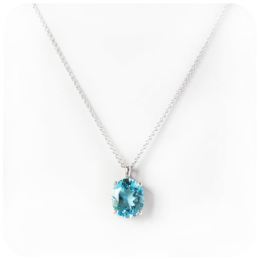 Lana, an Oval cut Sky Blue Topaz Pendant and Chain