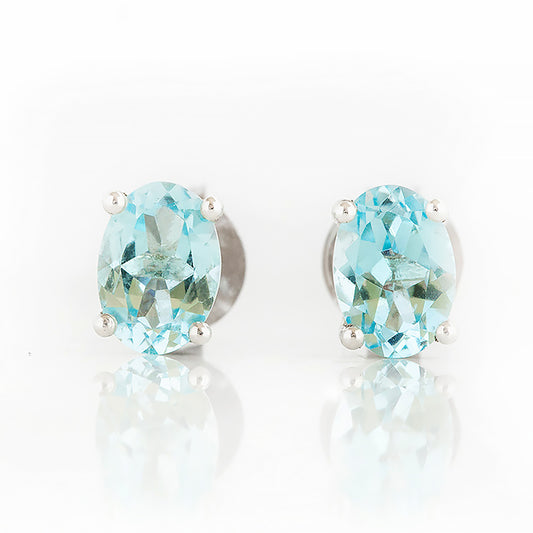 Luna, Oval cut Sky Blue Topaz Stud Earring - 7x5mm
