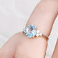 Este, an Oval cut Sky Blue Topaz and Lab Diamond Ring
