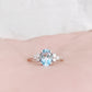 Este, an Oval cut Sky Blue Topaz and Lab Diamond Ring