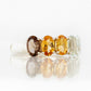 Arabella Autumn, an Oval cut Half Eternity Ring