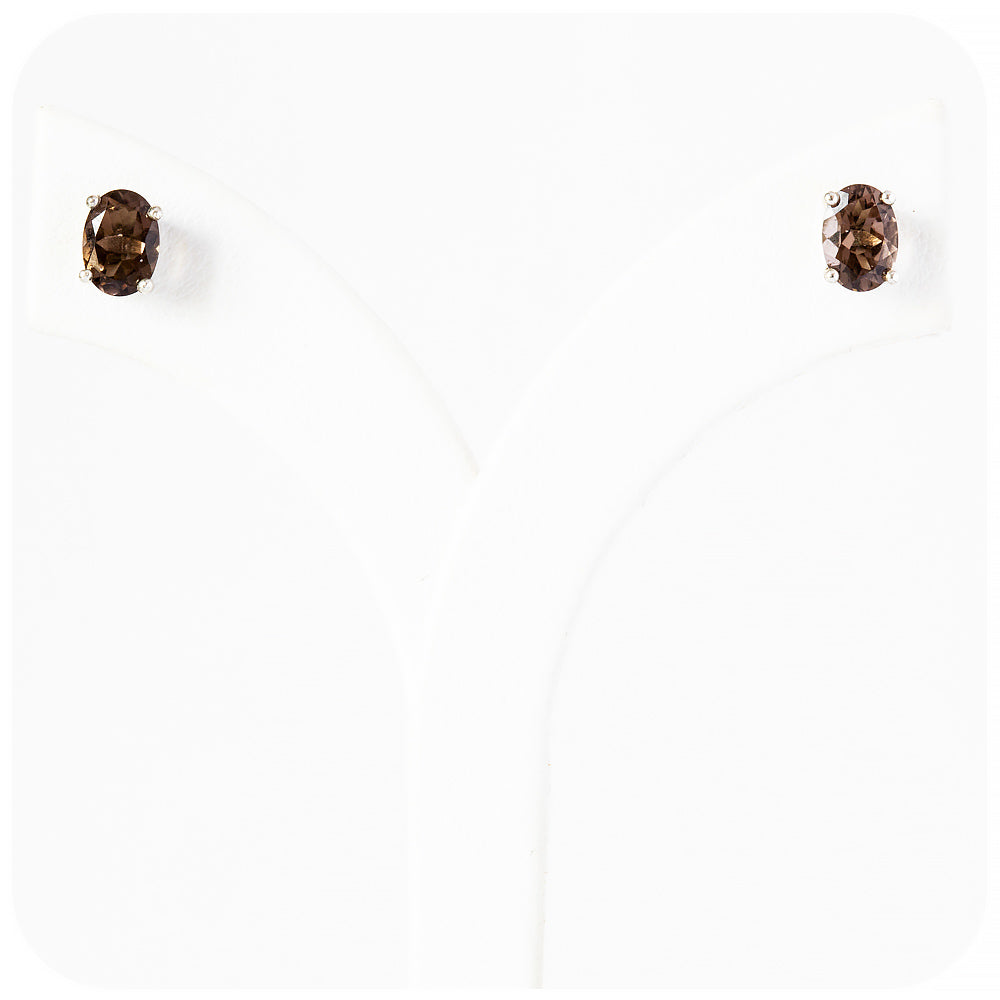 oval cut brown smoky quartz stud earrings in sterling silver