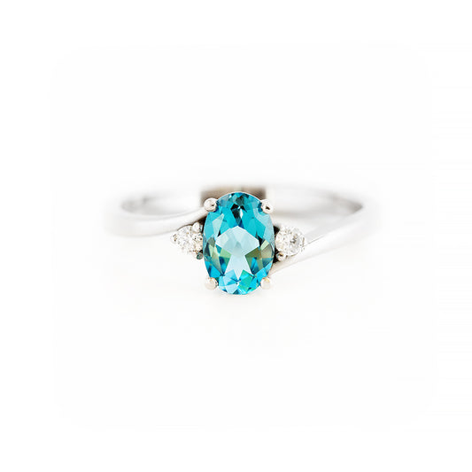 Oval cut Swiss Blue Topaz and Lab Diamond Trilogy Engagement Ring in White Gold - Victoria's Jewellery