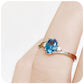 Oval cut Swiss Blue Topaz and Lab Diamond Trilogy Engagement Ring in White Gold - Victoria's Jewellery