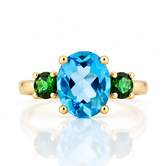 Hallie, a Topaz and Green Tourmaline Oval Trilogy Ring