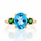 Hallie, a Topaz and Green Tourmaline Oval Trilogy Ring - Victoria's Jewellery