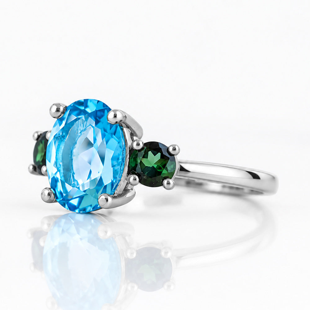 Hallie, a Topaz and Green Tourmaline Oval Trilogy Ring - Victoria's Jewellery