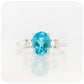 Oval cut Swiss Blue Topaz and White Quartz Trilogy Anniversary Ring - Victoria's Jewellery