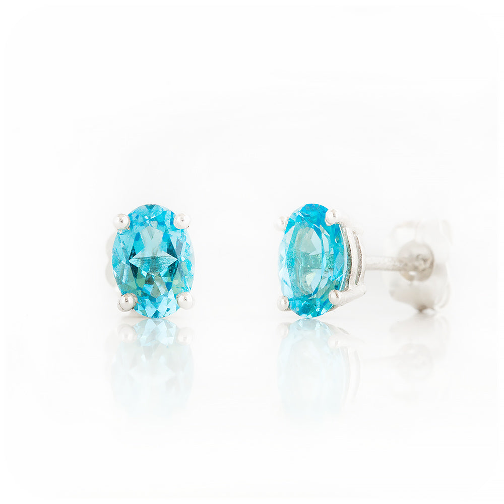 Luna, an Oval cut Swiss Blue Topaz Stud Earring - 7x5mm