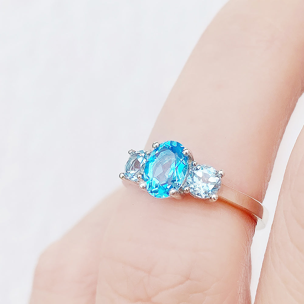 Lucy, a Swiss and Sky Blue Topaz Ring - Victoria's Jewellery