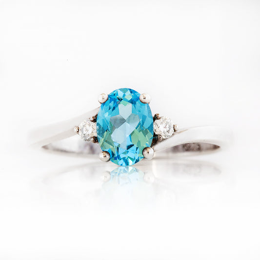 Georgie, a Swiss Blue Topaz and Diamond Trilogy Ring