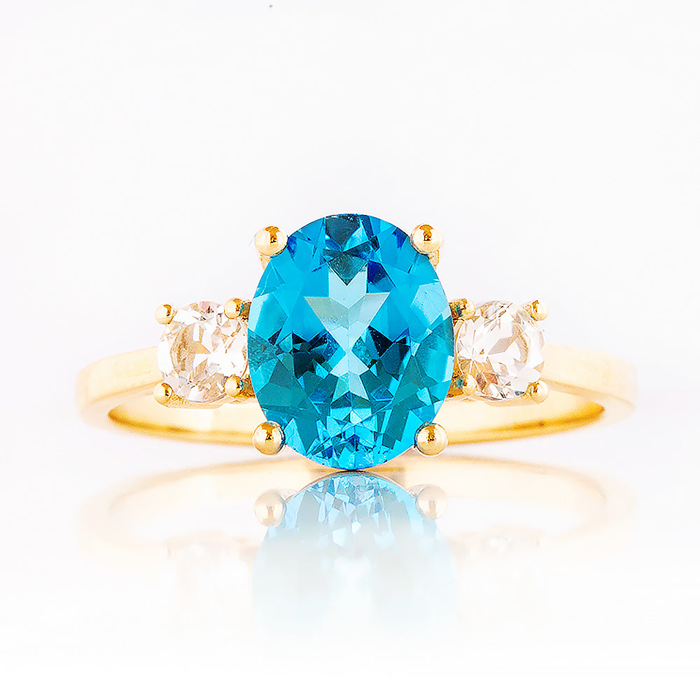 Hallie, a Swiss Blue Topaz and Clear Quartz Trilogy Ring - Victoria's Jewellery