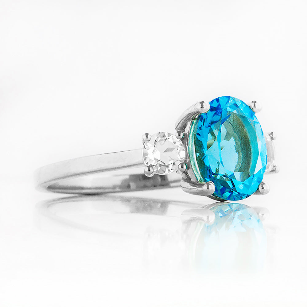 Hallie, a Swiss Blue Topaz and Clear Quartz Trilogy Ring - Victoria's Jewellery