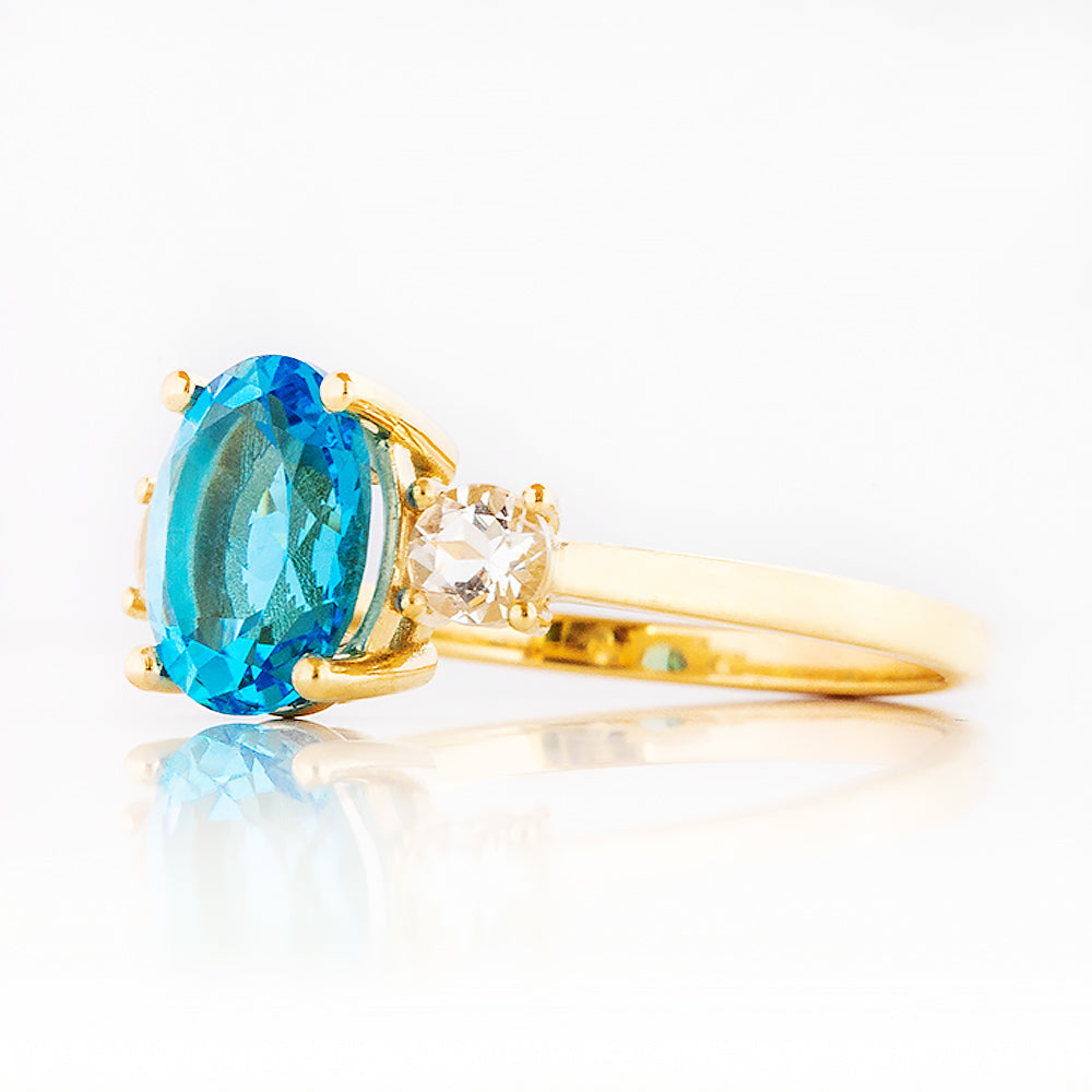 Hallie, a Swiss Blue Topaz and Clear Quartz Trilogy Ring - Victoria's Jewellery